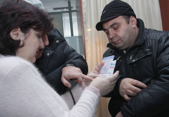 Georgian observers at polling station in Donetsk