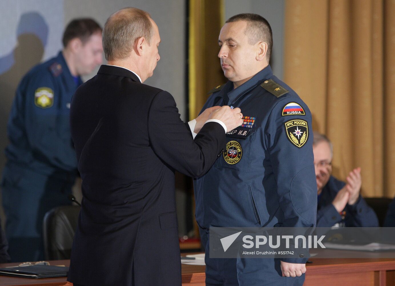 Vladimir Putin awarding best officials