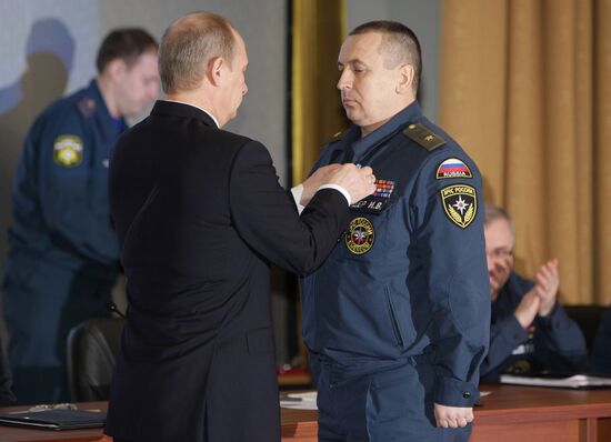 Vladimir Putin awarding best officials
