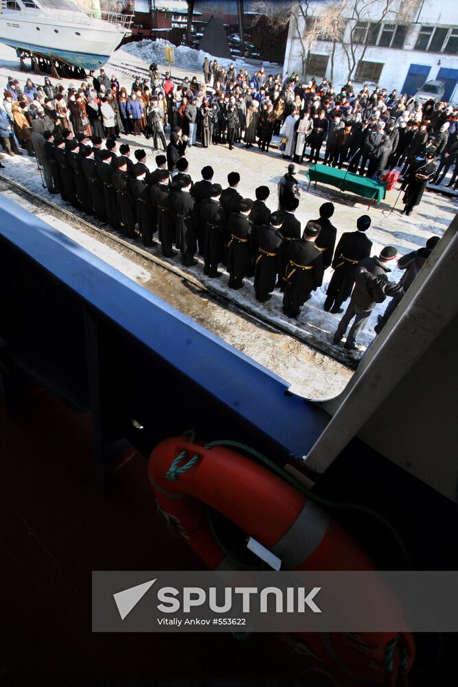 Ceremonial raising of naval ensign on Ishim tanker