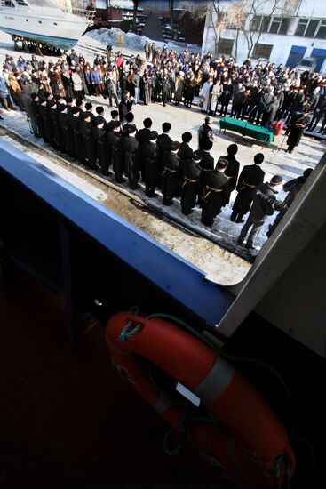 Ceremonial raising of naval ensign on Ishim tanker