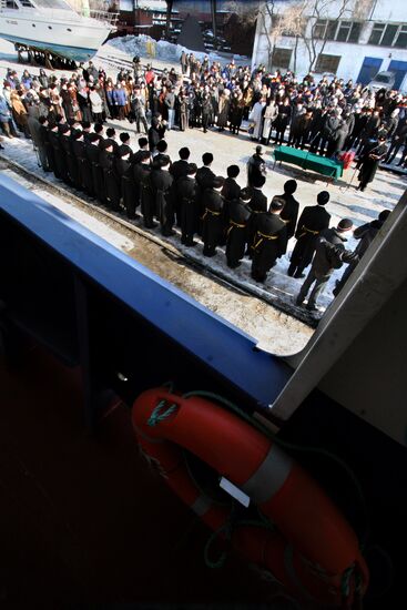 Ceremonial raising of naval ensign on Ishim tanker