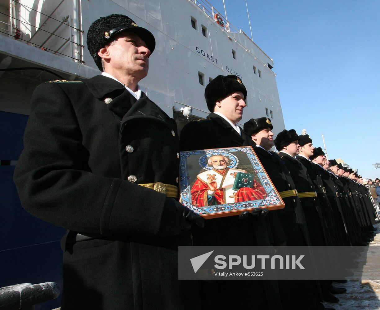 Ceremonial raising of naval ensign on Ishim tanker