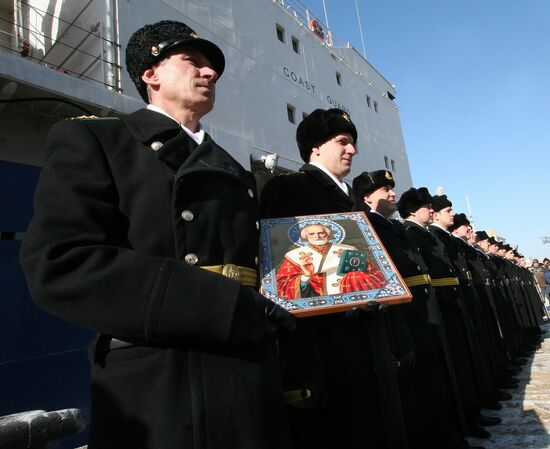Ceremonial raising of naval ensign on Ishim tanker