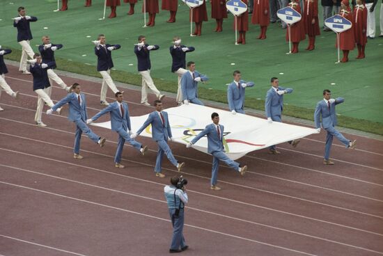 Carrying the Olympic flag
