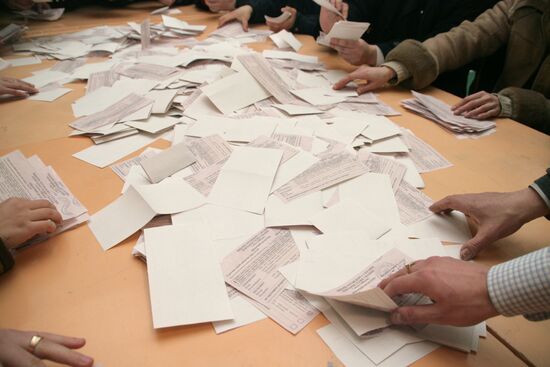 Counting votes at a polling station in Lvov