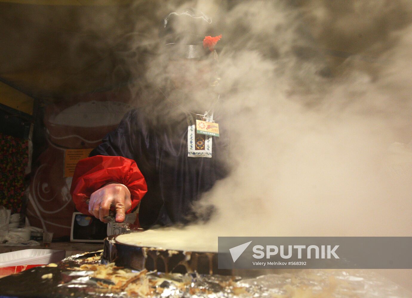 Making and selling pancakes at first day of Maslenitsa festival