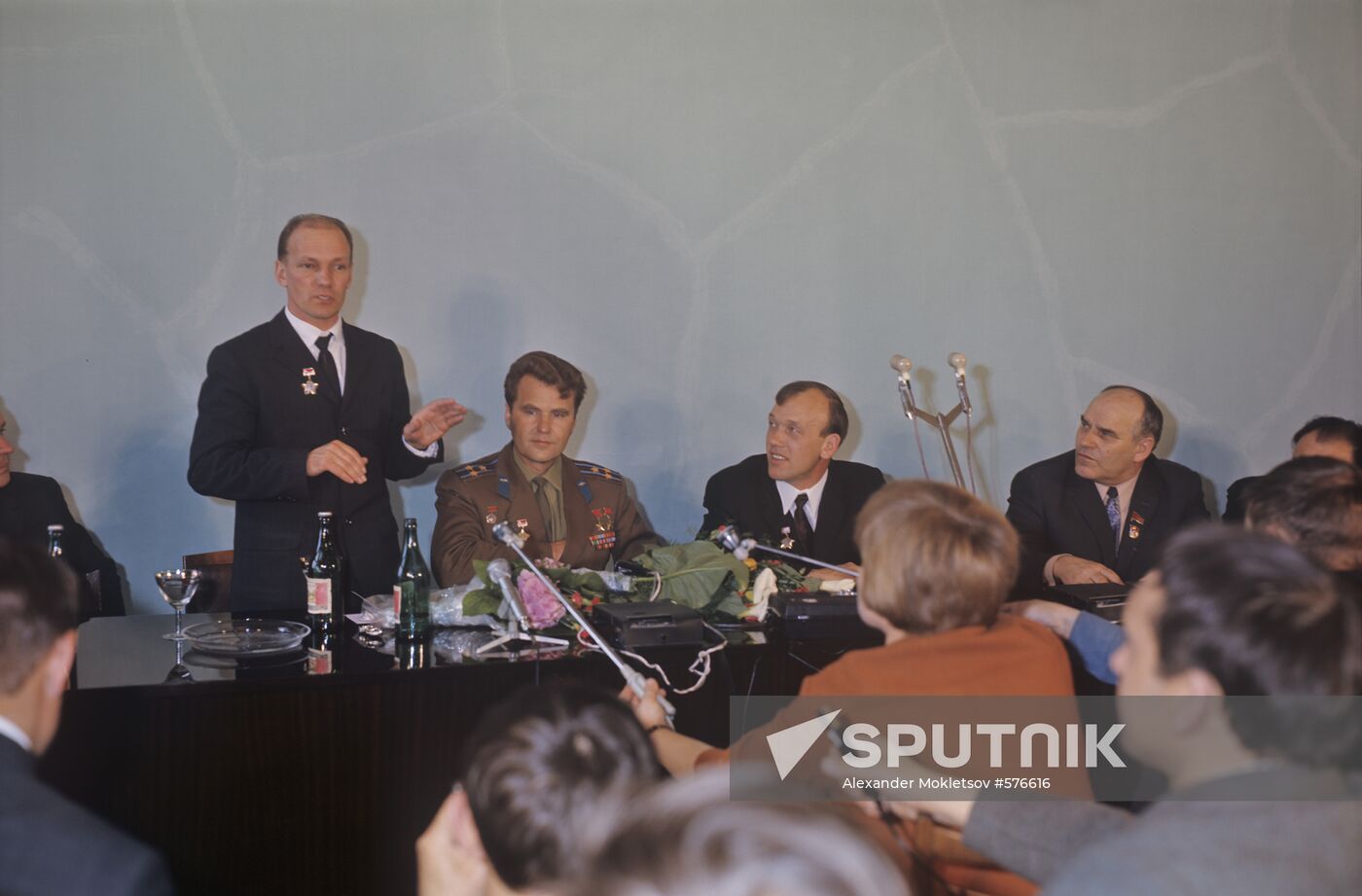 Crew member of space ship "Soyuz-10" at news conference