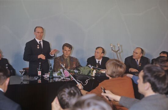 Crew member of space ship "Soyuz-10" at news conference