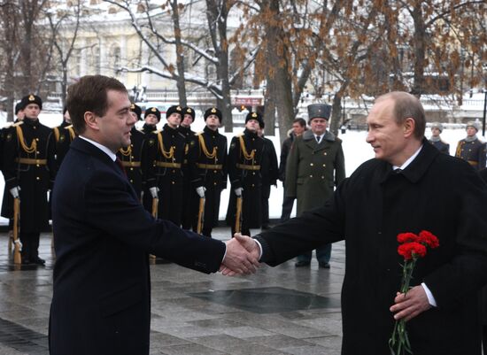 Dmitry Medvedev and Vladimir Putin attending ceremony