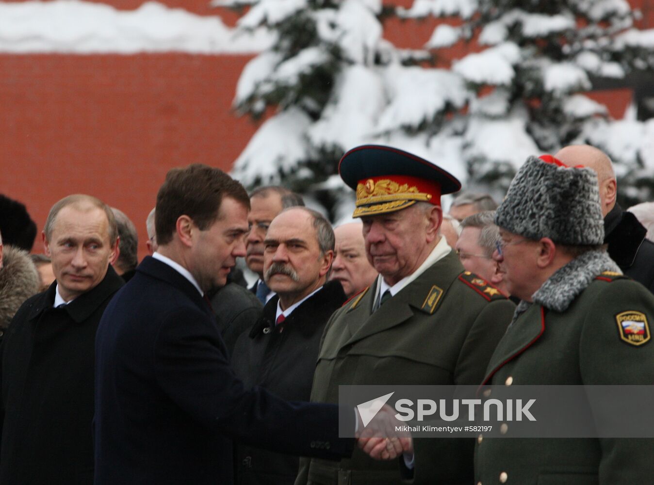 Dmitry Medvedev and Vladimir Putin attending ceremony