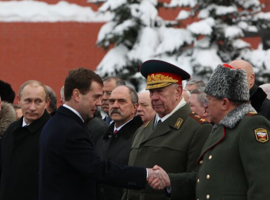 Dmitry Medvedev and Vladimir Putin attending ceremony