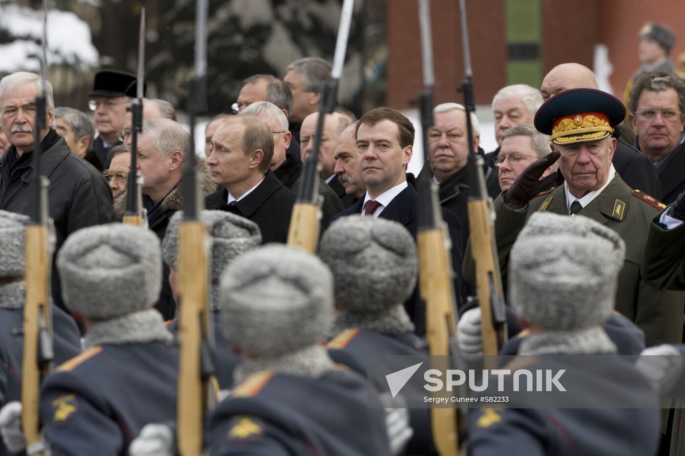 Dmitry Medvedev and Vladimir Putin attending ceremony