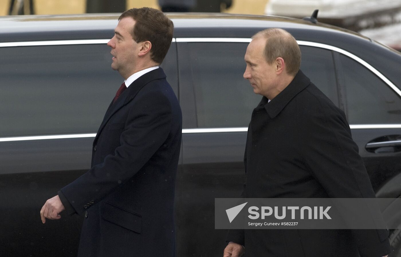 Dmitry Medvedev and Vladimir Putin attending ceremony