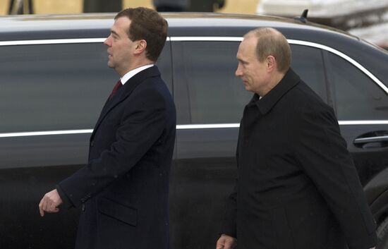 Dmitry Medvedev and Vladimir Putin attending ceremony