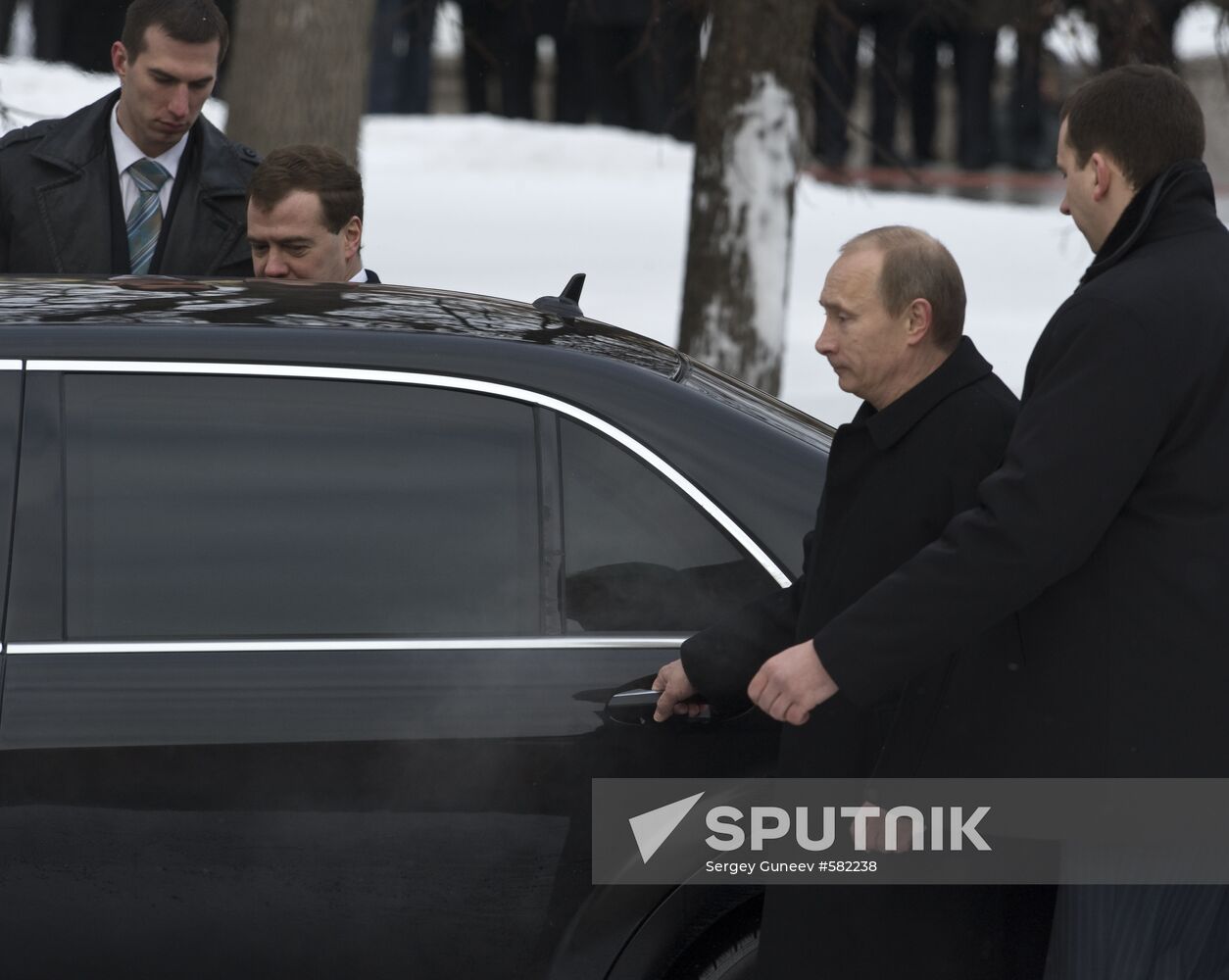 Dmitry Medvedev and Vladimir Putin attending ceremony