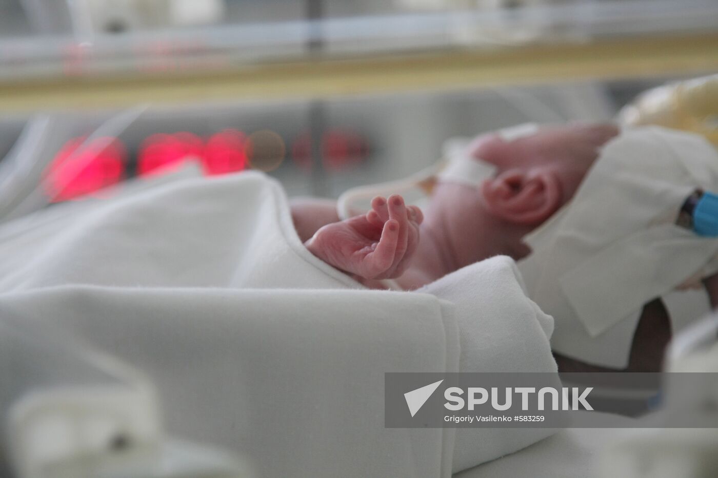 Newborn at premature neonate care unit