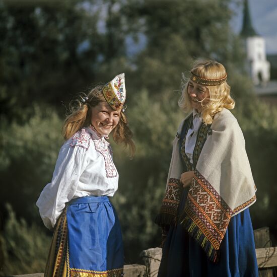 Girls wearing Latvian national costumes