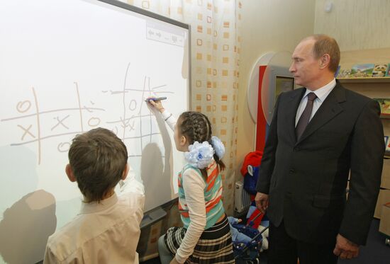 Vladimir Putin visits Tyumen Research Library