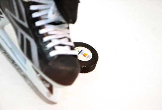 Puck with symbol of XXI Olympic Winter Games