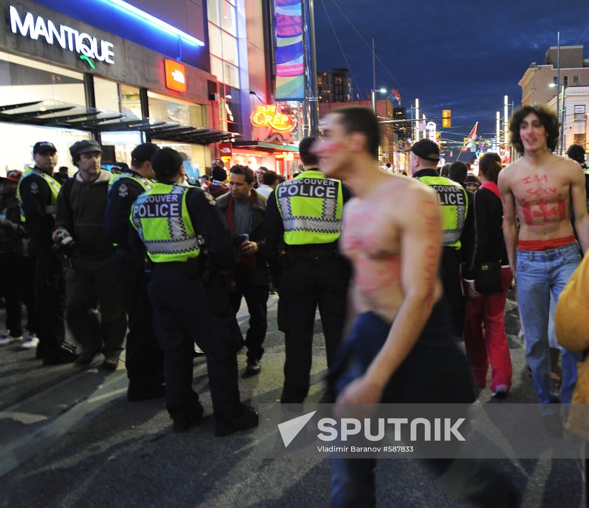 Canadian policemen and fans