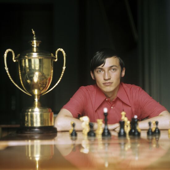 Soviet Chess Grandmaster Anatoly Karpov arriving at London's