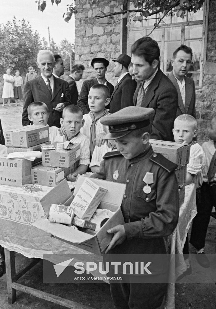 Lend-Lease food packages handed out