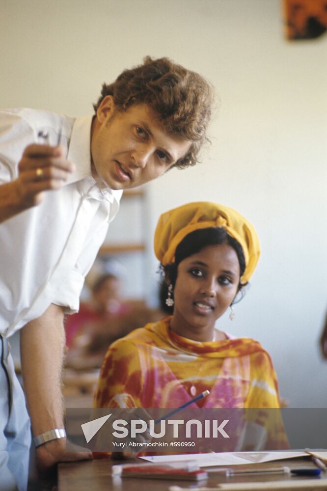 Teacher Vsevolod Filipp with student Fatuma Sapor