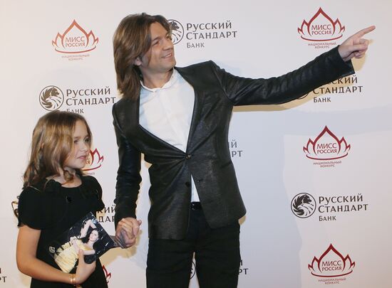 Dmitry Malikov with his daughter