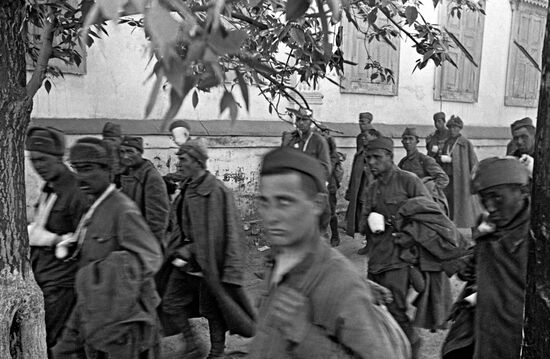 Wounded Red Army soldiers walking away from the frontline