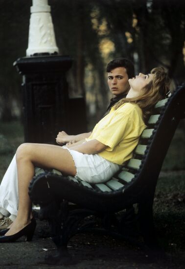 Young people on a park bench