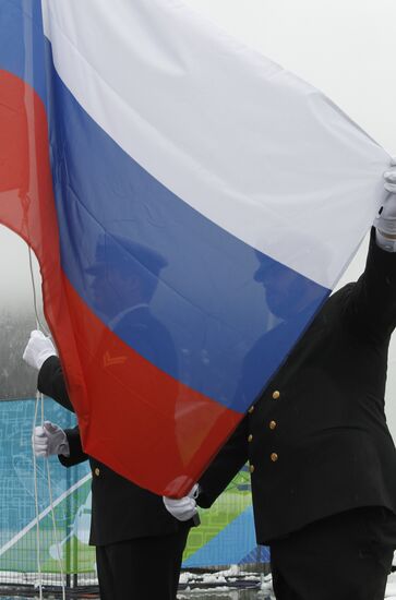 Raising Russian flag in Paralympic Village