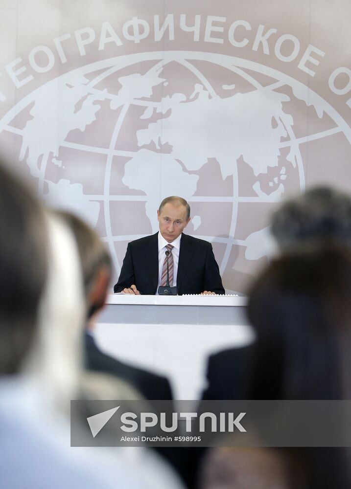 Vladimir Putin attends meeting at Russian Geographical Society