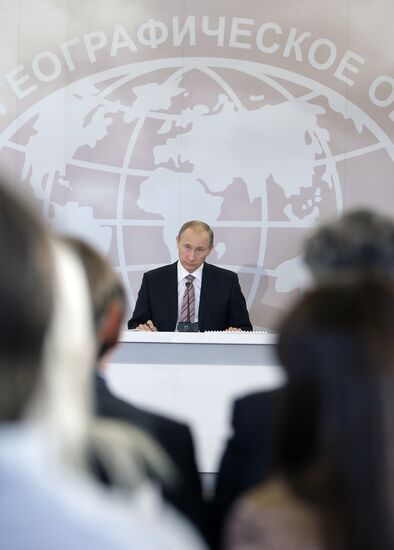 Vladimir Putin attends meeting at Russian Geographical Society