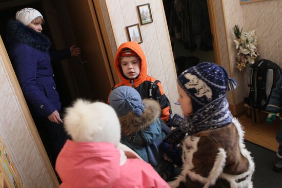 Children prepare for a walk