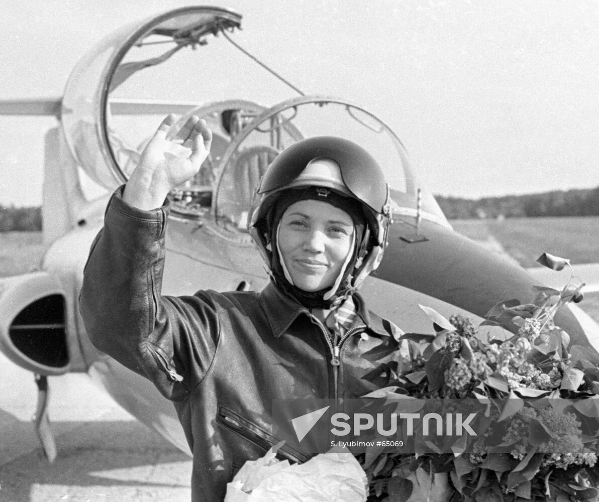 Woman-pilot Marina Popovich near L-29 plane