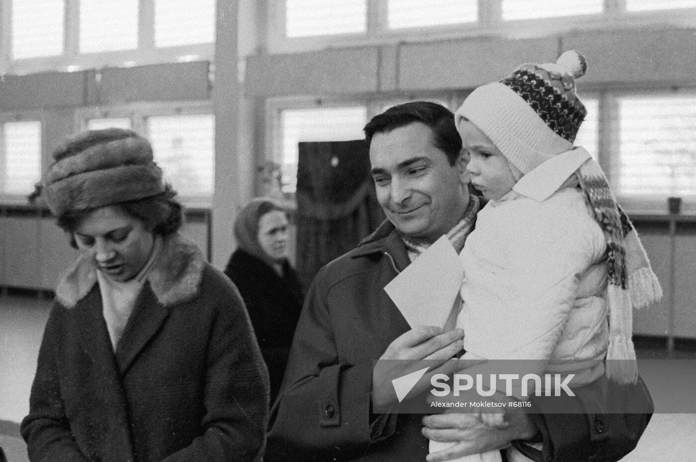 Valery Bykovsky, pilot-cosmonaut of the USSR, with his wife and son. 