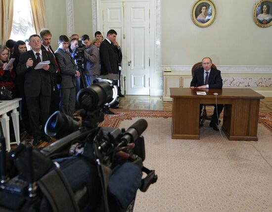 Vladimir Putin conducts TV link-up with Igor Sechin