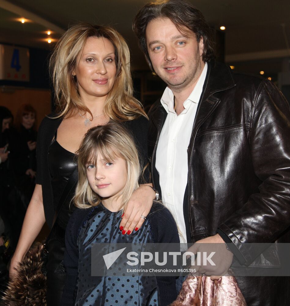 Marina and Alexander Chernyayevs with daughter