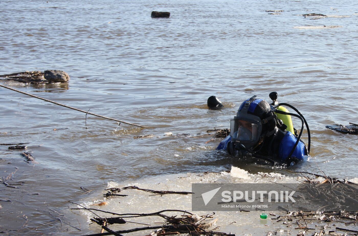 Rescuer diving in ice water