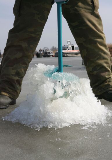 EMERCOM employees prepare to explode ice