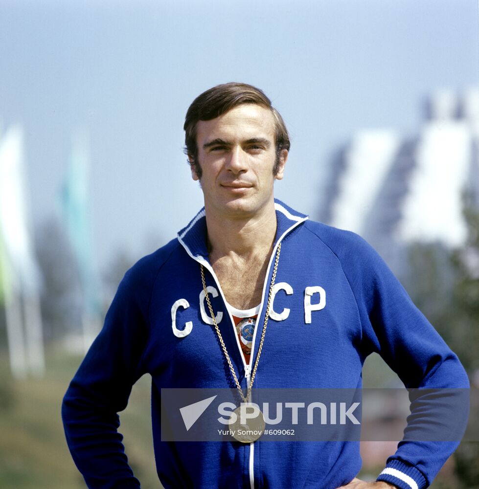 Viktor Saneev with Olympic medal