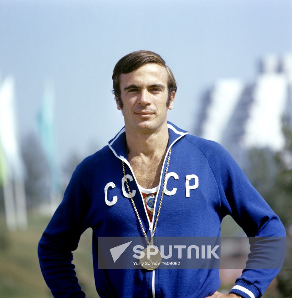 Viktor Saneev with Olympic medal