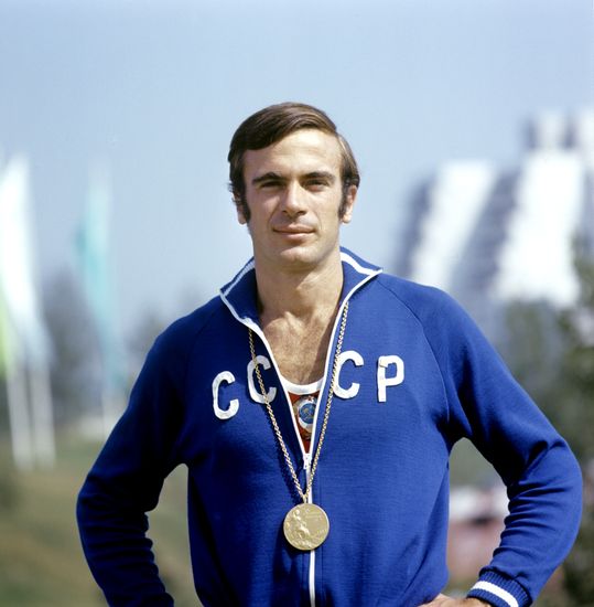 Viktor Saneev with Olympic medal
