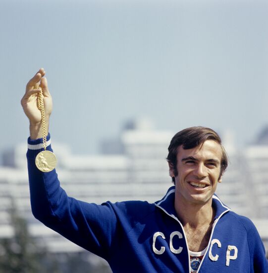 Viktor Saneev with Olympic medal