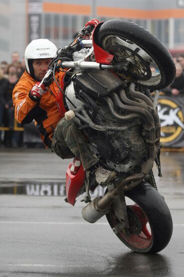 Bike riders compete at motorcycle stunt riding contest