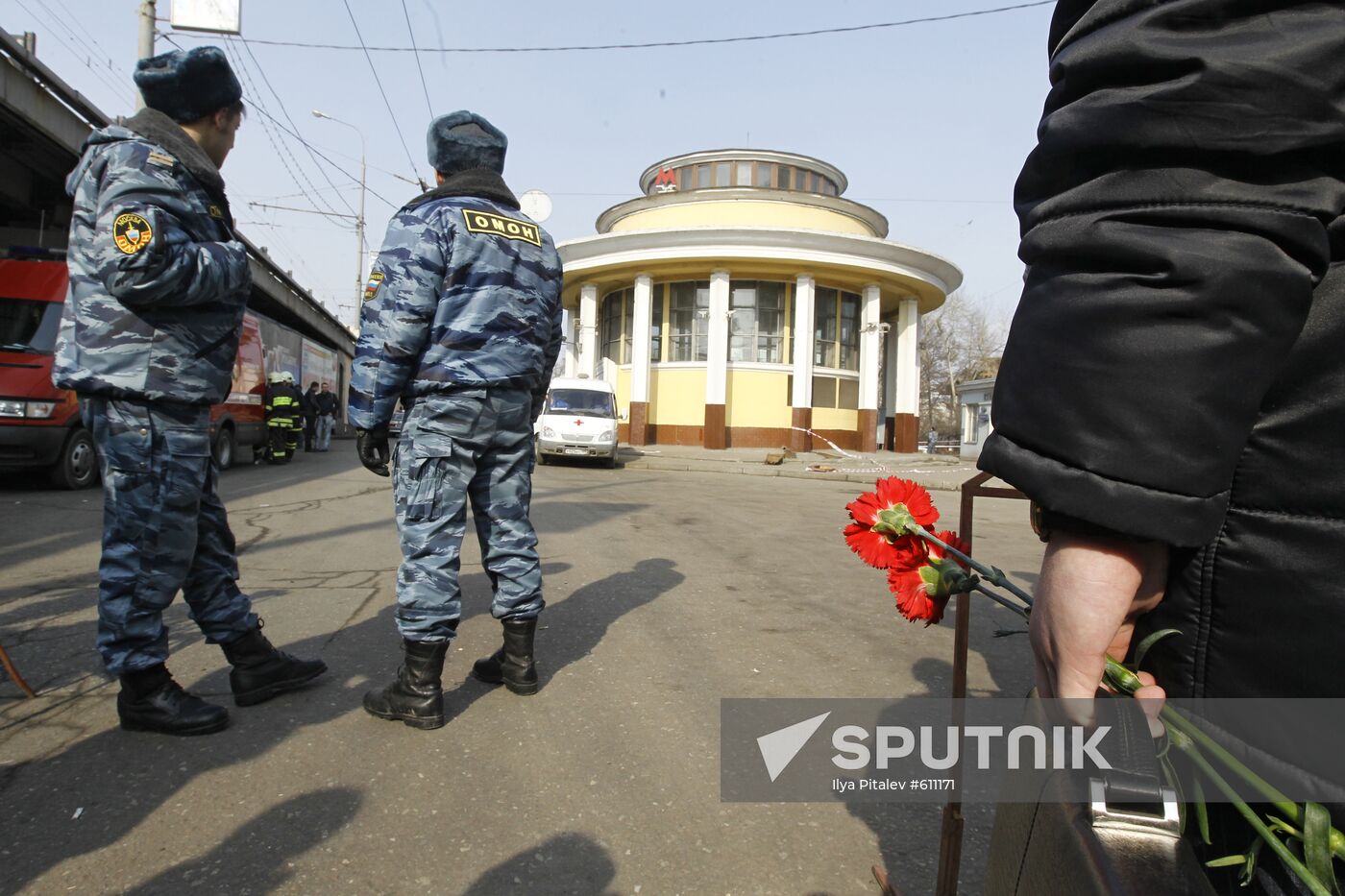 People bring flowers to Moscow's Park Kultury metro station