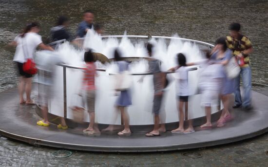 Tourists at the Fountain of Wealth