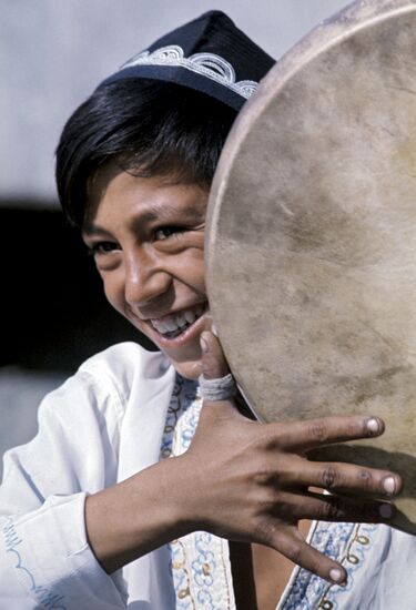 Uzbek boy plays doira