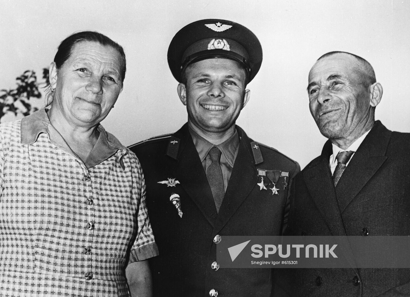 Yuri Gagarin with his parents